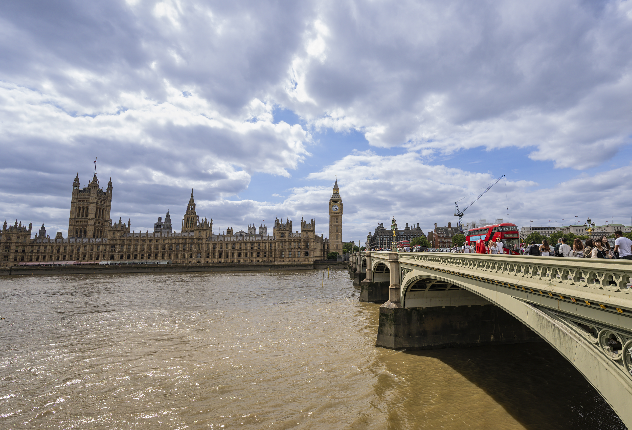 A photograph of the Houses of Parliament from the opposite side of the River Thames and including Westminster Bridge