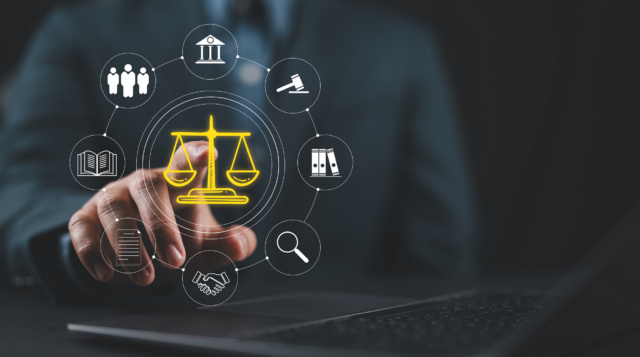 An illustrative image showing a hand pointing to some superimposed symbols, including a drawing of the scales of justice (image: Adobe Stock images)